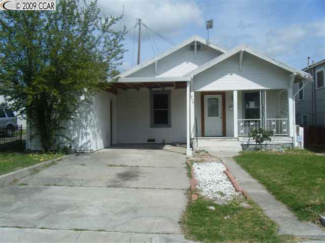 320 Bruning Avenue Rio Vista, CA 94571 - Photo 1 of 1 a front view of a house with garden