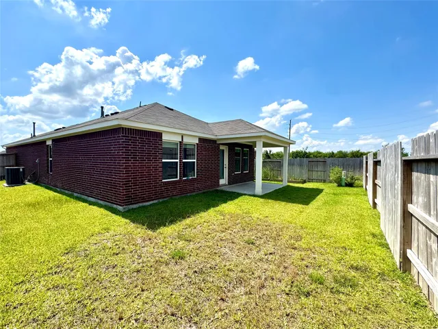 a view of a backyard with garden