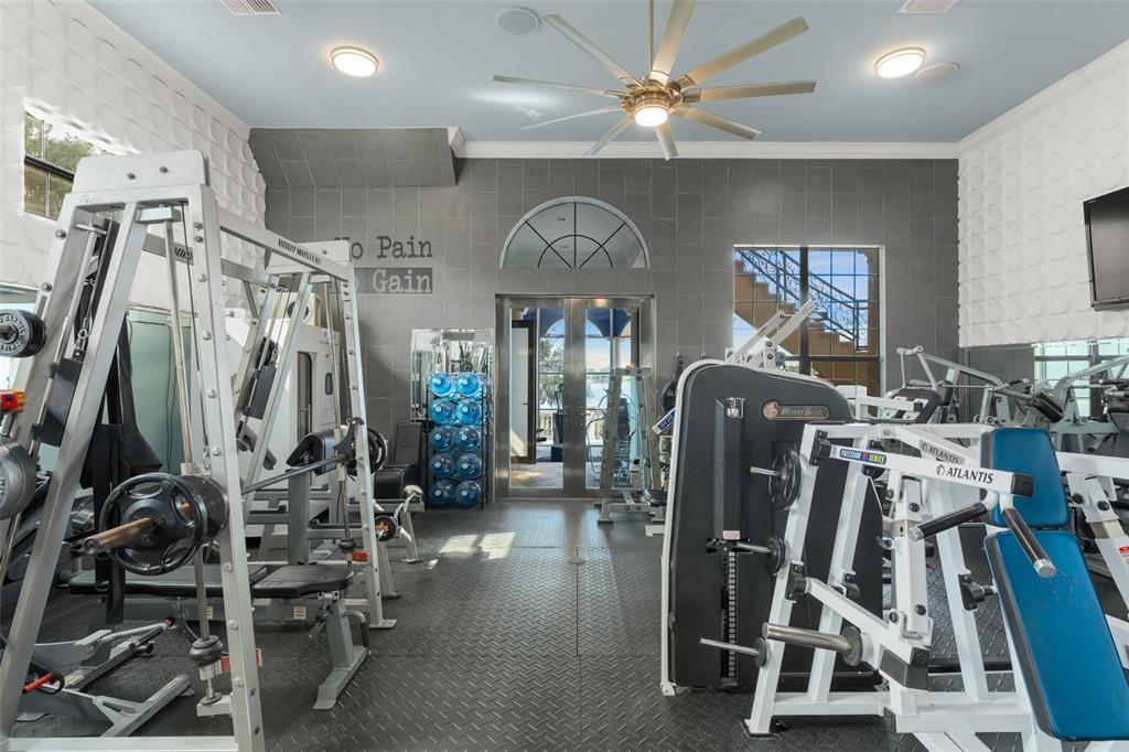 9639 Westover Roberts Road Windermere, FL 34786 - Photo 15 of 65 a view of a room with gym equipment
