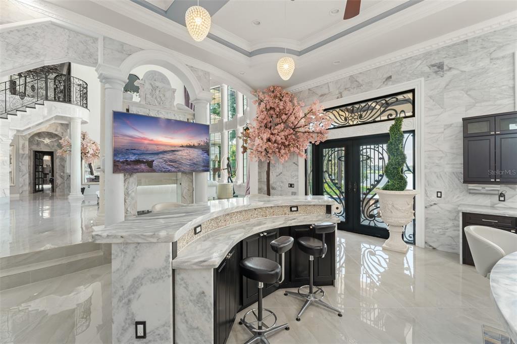 9639 Westover Roberts Road Windermere, FL 34786 - Photo 22 of 65 a living room with fireplace furniture and a large window