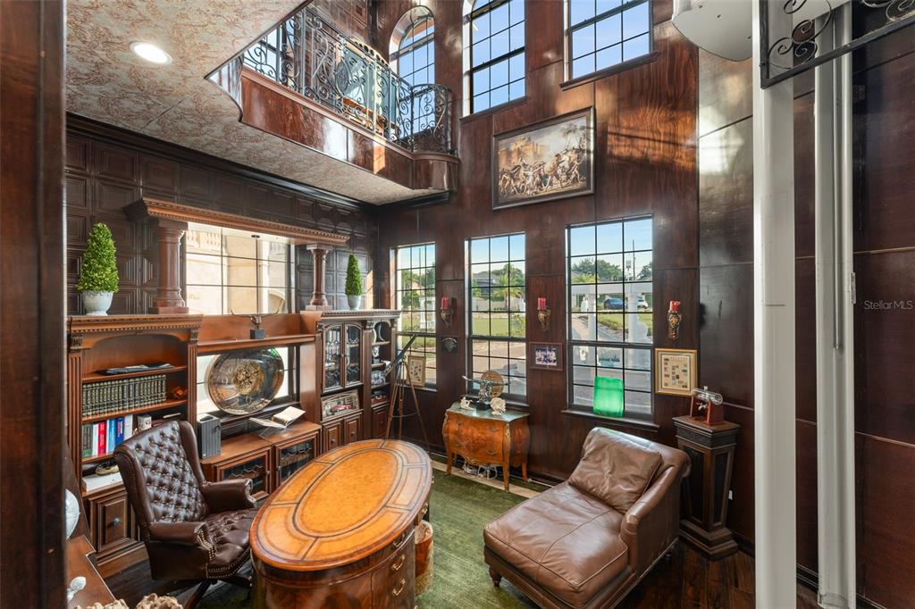 9639 Westover Roberts Road Windermere, FL 34786 - Photo 40 of 65 a view of a chairs and a table in a balcony