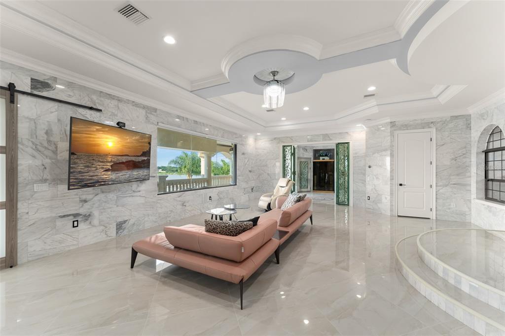 9639 Westover Roberts Road Windermere, FL 34786 - Photo 47 of 65 a living room with furniture and a flat screen tv