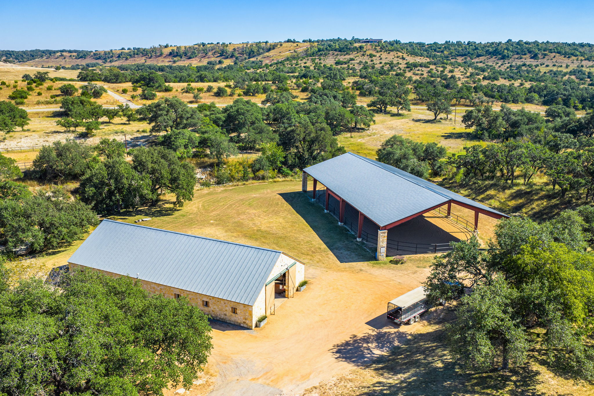 1495 Walnut Springs Road Johnson City, TX 78636 - Photo 15 of 23 an aerial view of residential houses with outdoor space and trees
