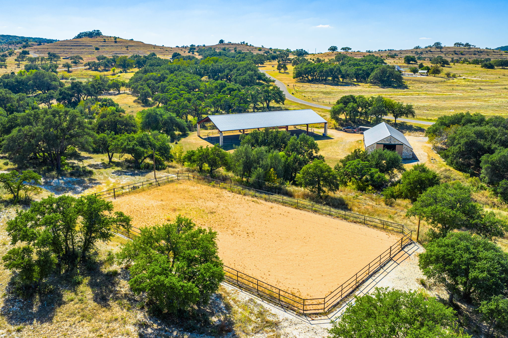 1495 Walnut Springs Road Johnson City, TX 78636 - Photo 19 of 23 an aerial view of residential houses with outdoor space and river