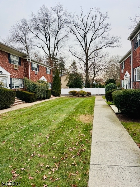 559 South Springfield Avenue Springfield, NJ 07081 - Photo 4 of 20 a view of a building with a yard