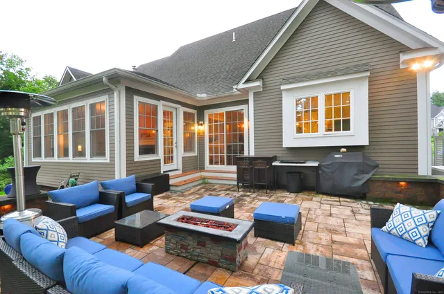 a building outdoor space with patio furniture