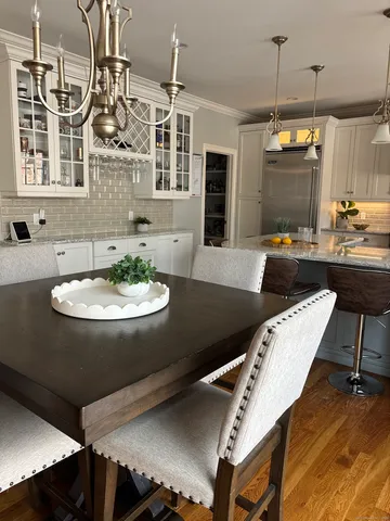 a view of a dining room with furniture