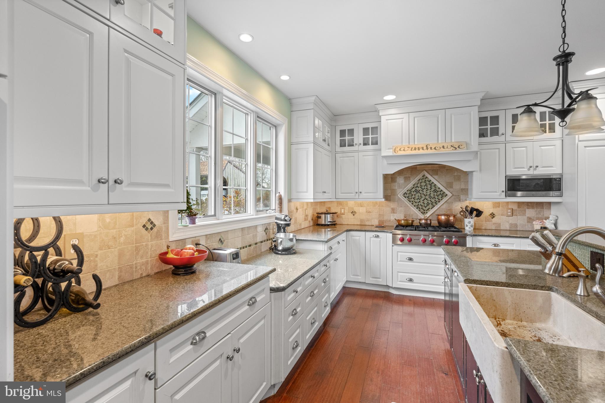 1936 Lenape Road West Chester, PA 19382 - Photo 12 of 72 a kitchen with a sink appliances cabinets and a large window