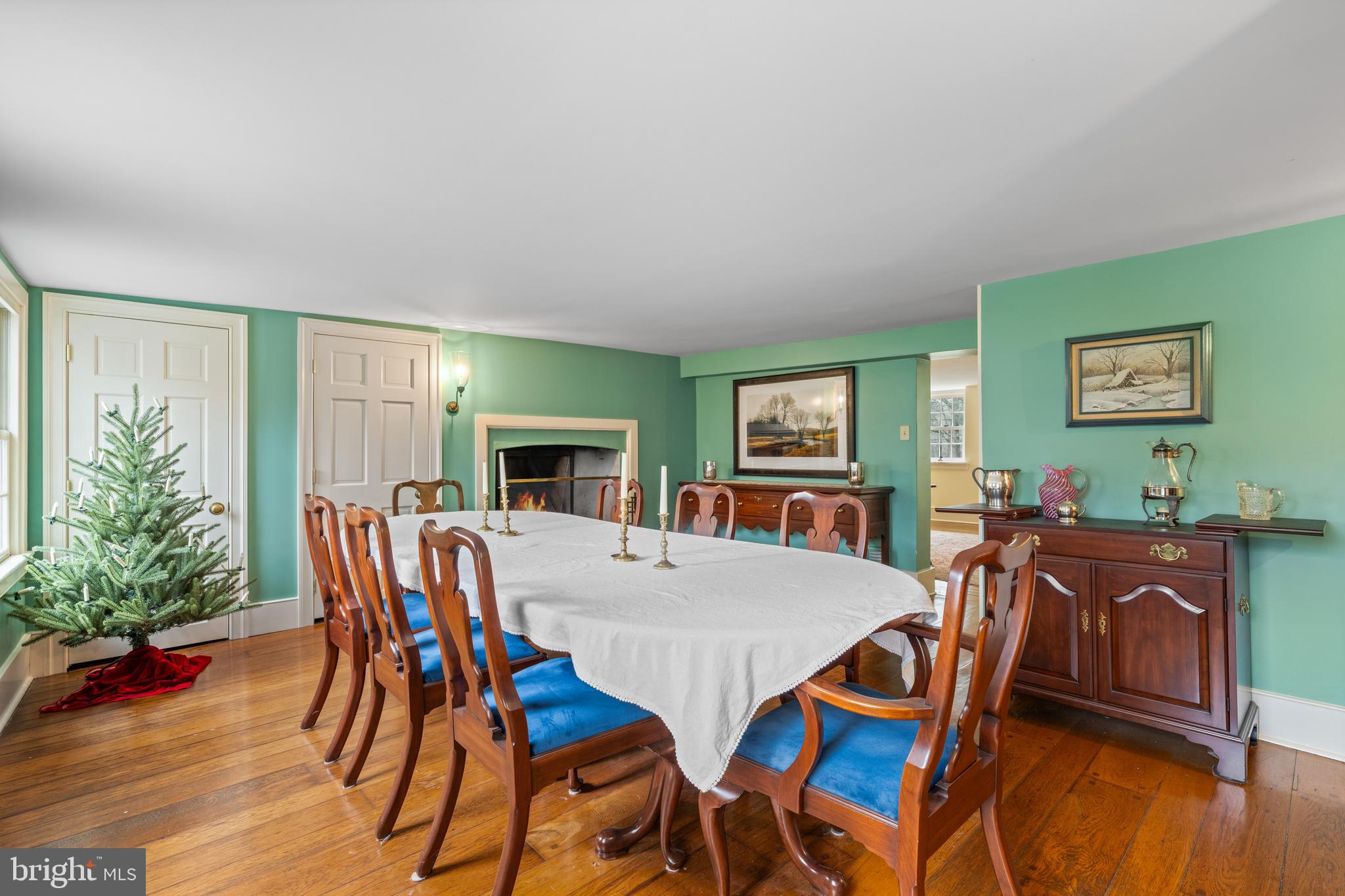 1936 Lenape Road West Chester, PA 19382 - Photo 16 of 72 a view of a dining room with furniture window and wooden floor