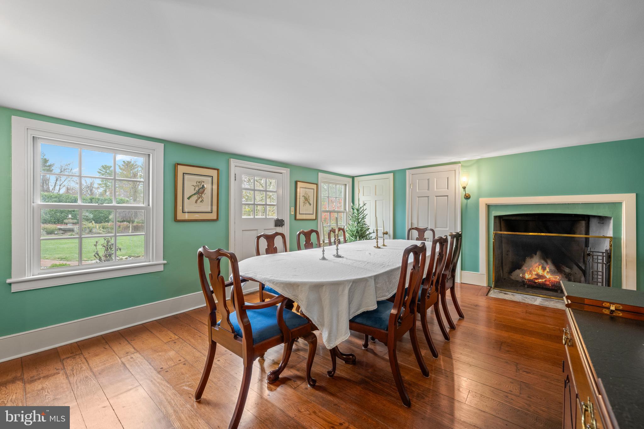 1936 Lenape Road West Chester, PA 19382 - Photo 17 of 72 a view of a dining room with furniture window and wooden floor