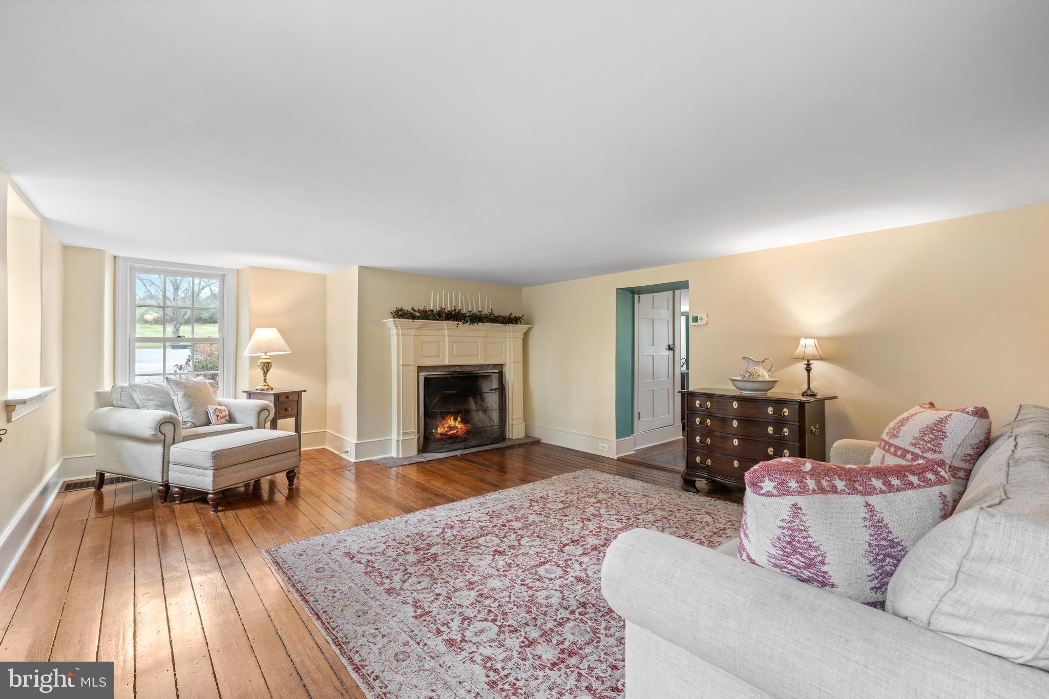 1936 Lenape Road West Chester, PA 19382 - Photo 20 of 72 a living room with furniture and a fireplace