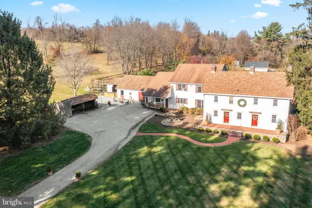 an aerial view of residential house with outdoor space