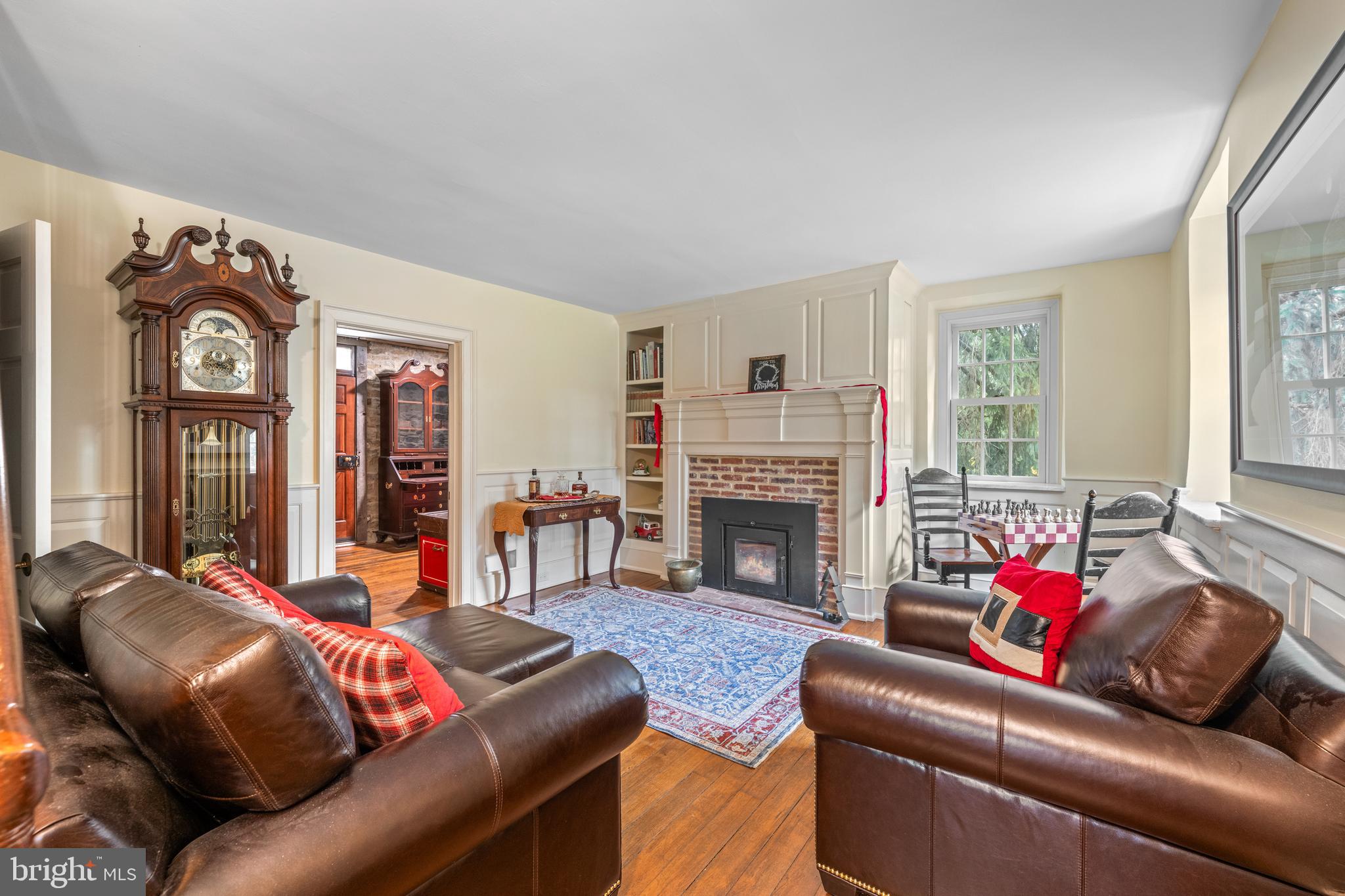 1936 Lenape Road West Chester, PA 19382 - Photo 23 of 72 a living room with furniture fireplace and flat screen tv