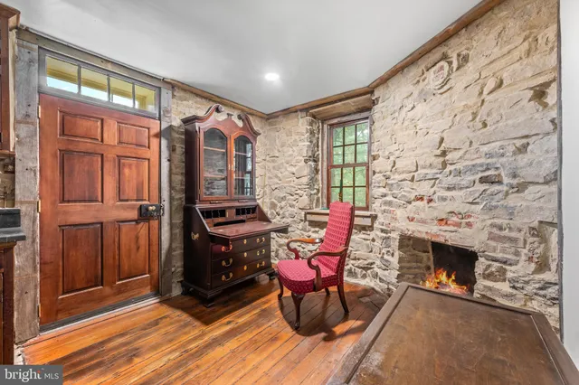 a spacious bedroom with a bed and window