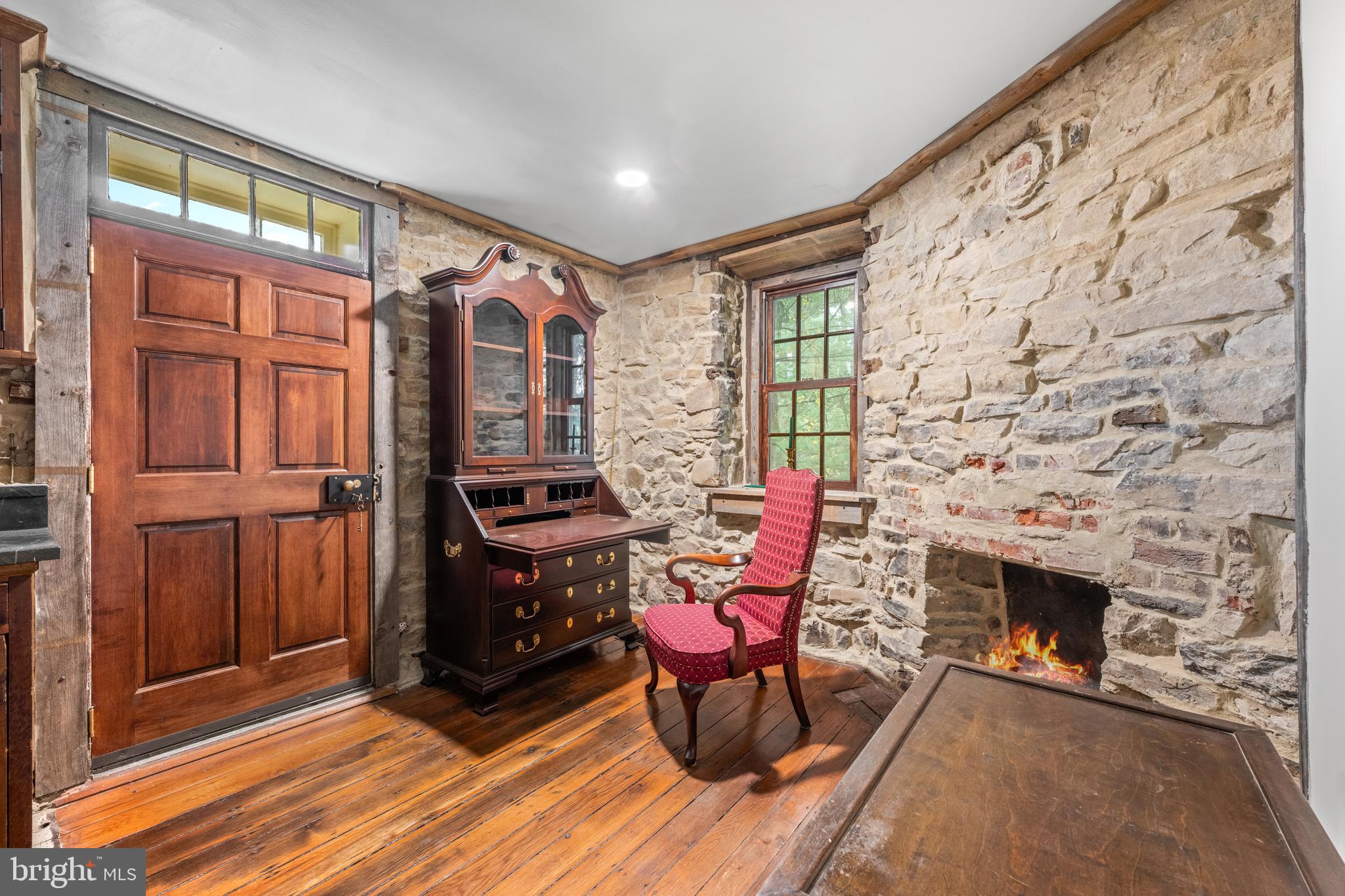 1936 Lenape Road West Chester, PA 19382 - Photo 25 of 72 a living room with furniture and a fireplace
