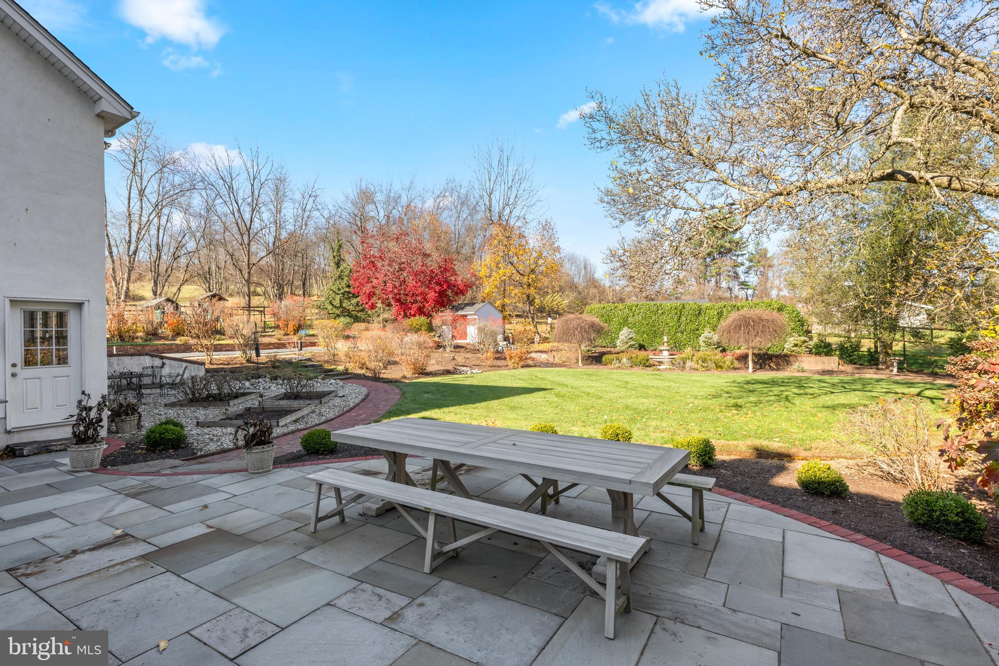 1936 Lenape Road West Chester, PA 19382 - Photo 27 of 72 a view of swimming pool with outdoor seating and yard