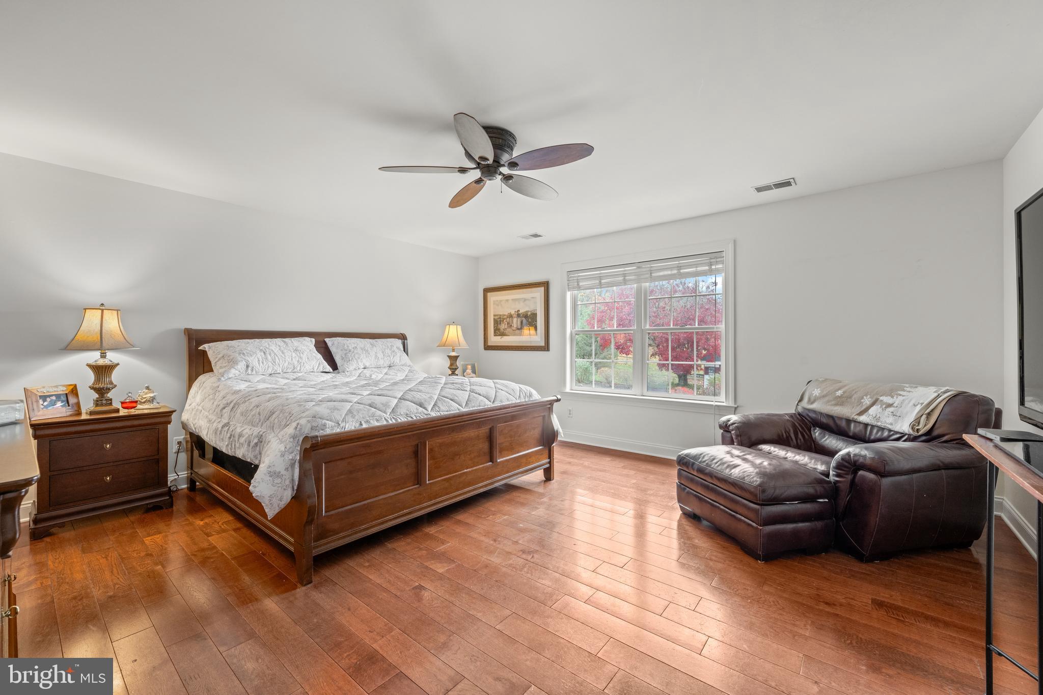 1936 Lenape Road West Chester, PA 19382 - Photo 32 of 72 a spacious bedroom with a bed and window