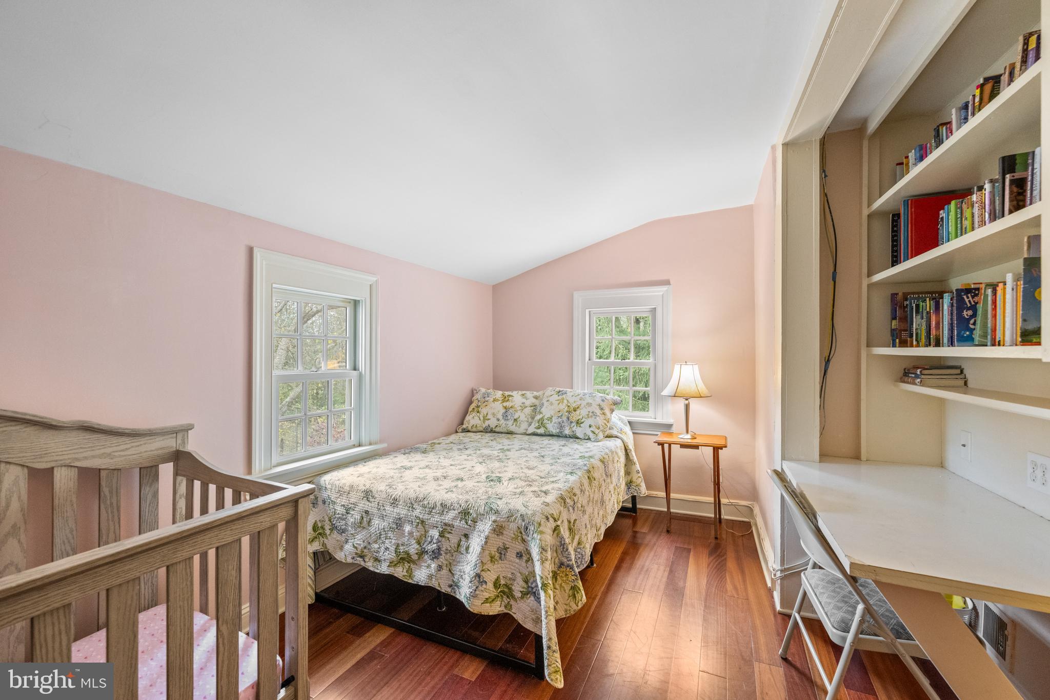 1936 Lenape Road West Chester, PA 19382 - Photo 48 of 72 a bedroom with a bed and a book shelf