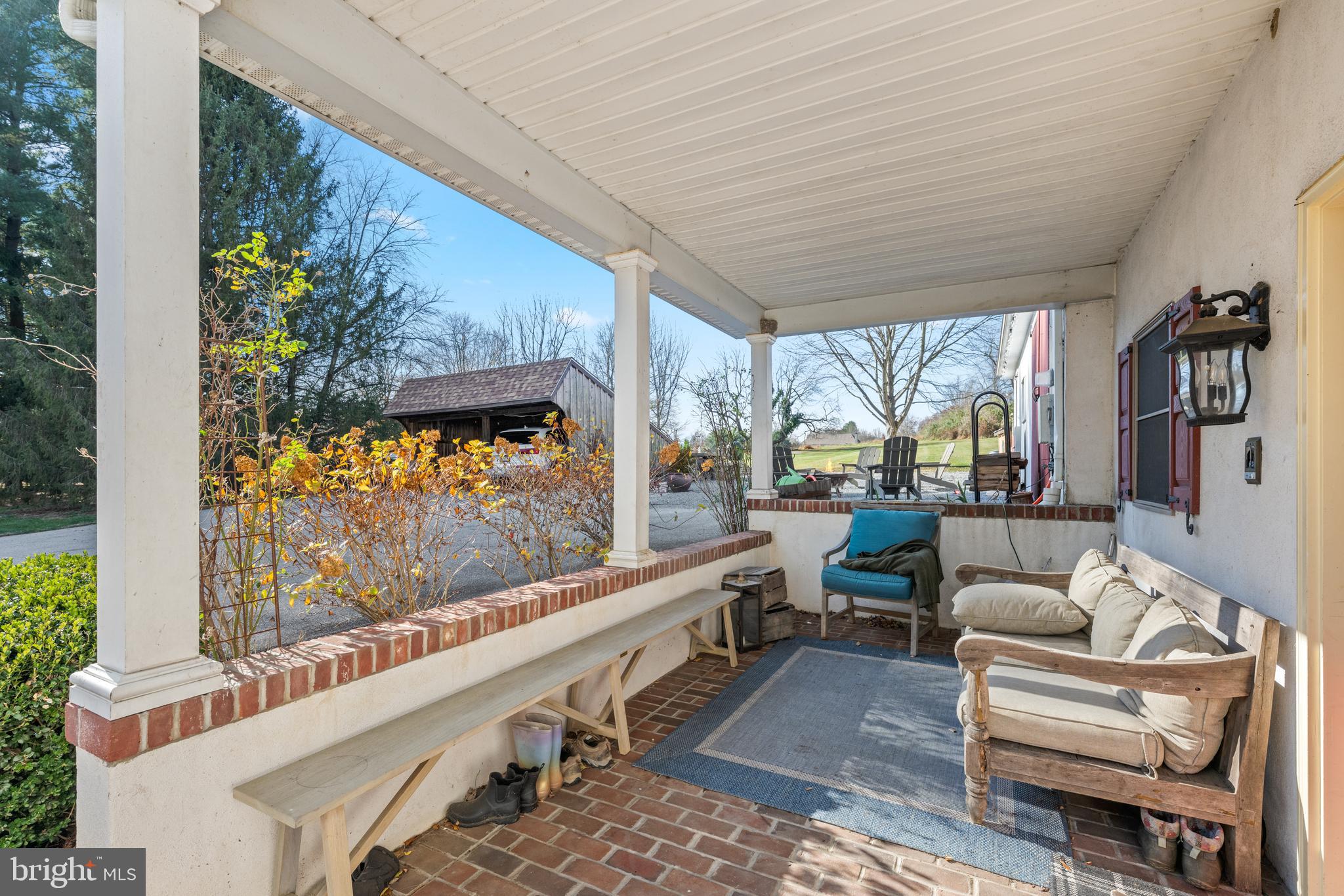 1936 Lenape Road West Chester, PA 19382 - Photo 7 of 72 a living room with patio furniture and a large window