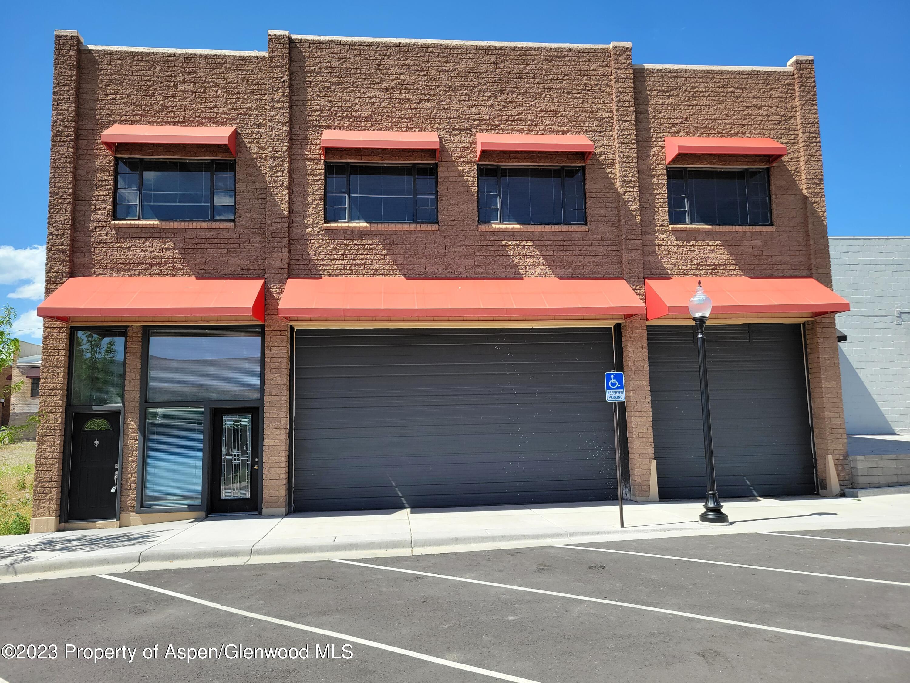 130 West 2nd Street, Unit 2 Rifle, CO 81650 - Photo 1 of 17 a view of a building with a parking space