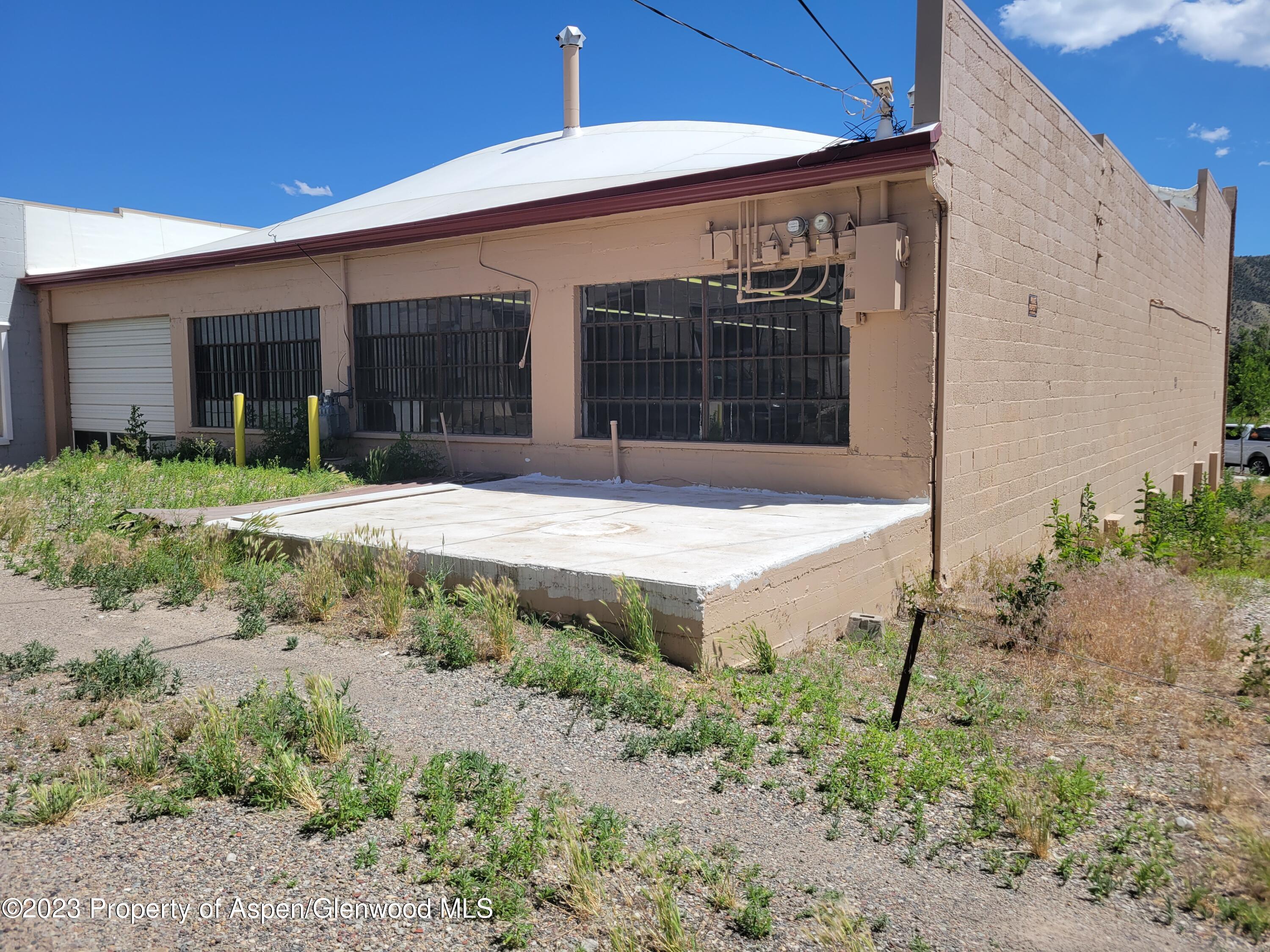 130 West 2nd Street, Unit 2 Rifle, CO 81650 - Photo 2 of 17 a house view with a backyard space