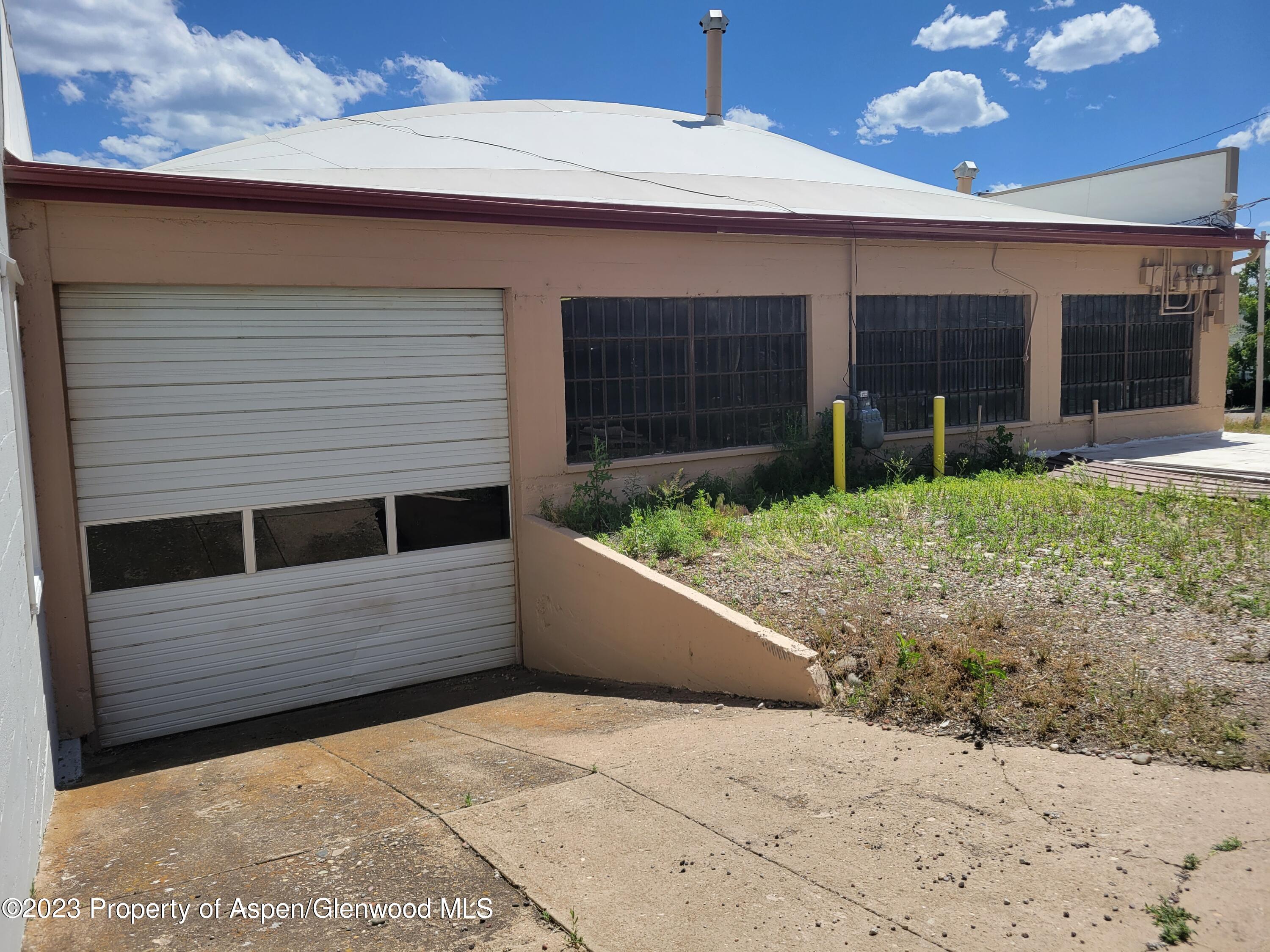 130 West 2nd Street, Unit 2 Rifle, CO 81650 - Photo 3 of 17 a view of a house with backyard