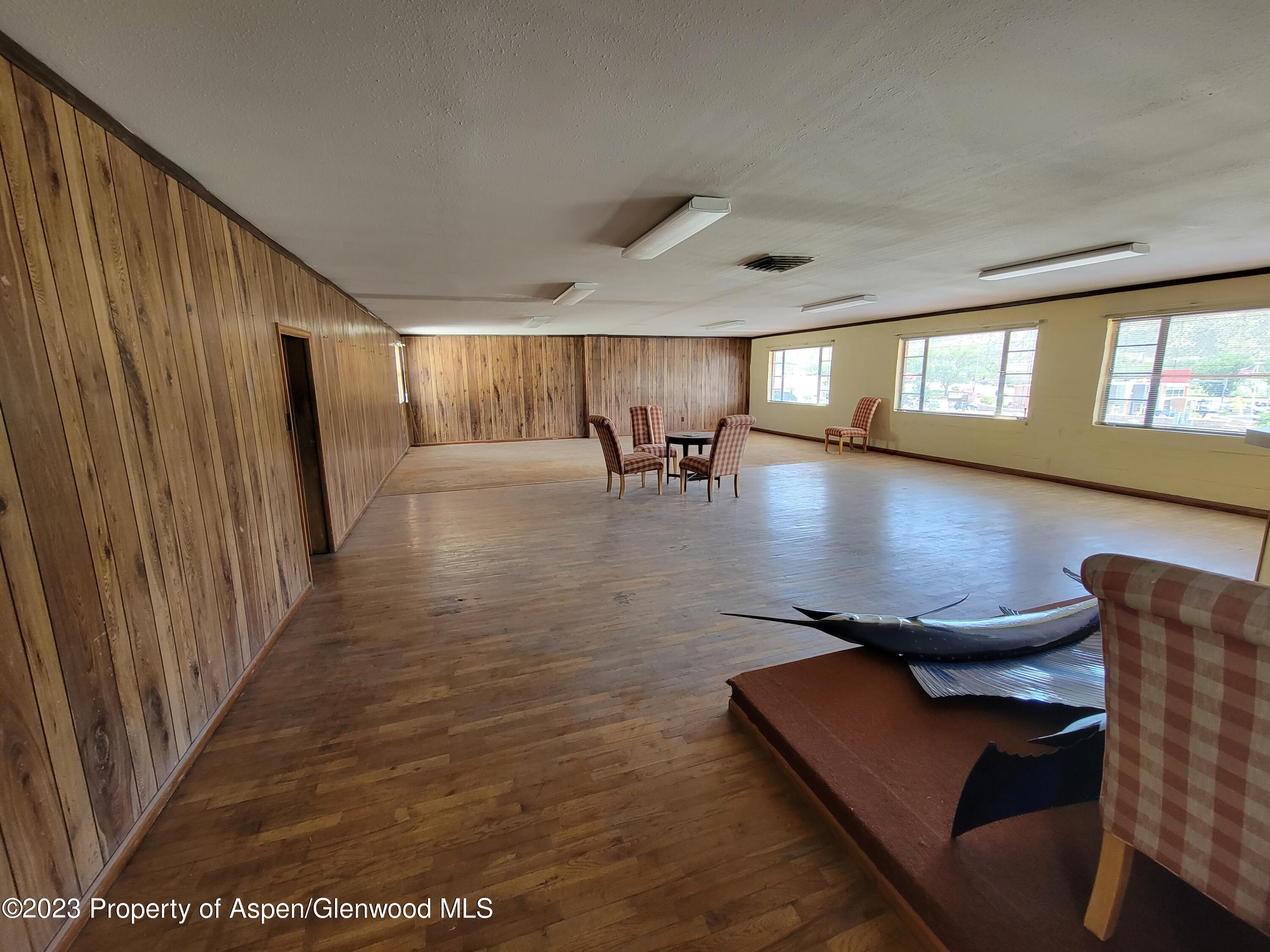 130 West 2nd Street, Unit 2 Rifle, CO 81650 - Photo 6 of 17 a living room with furniture and window