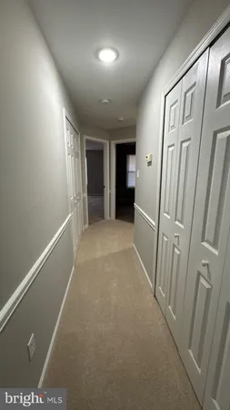 a view of hallway with stairs