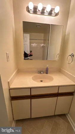 a bathroom with a shower and a bath tub