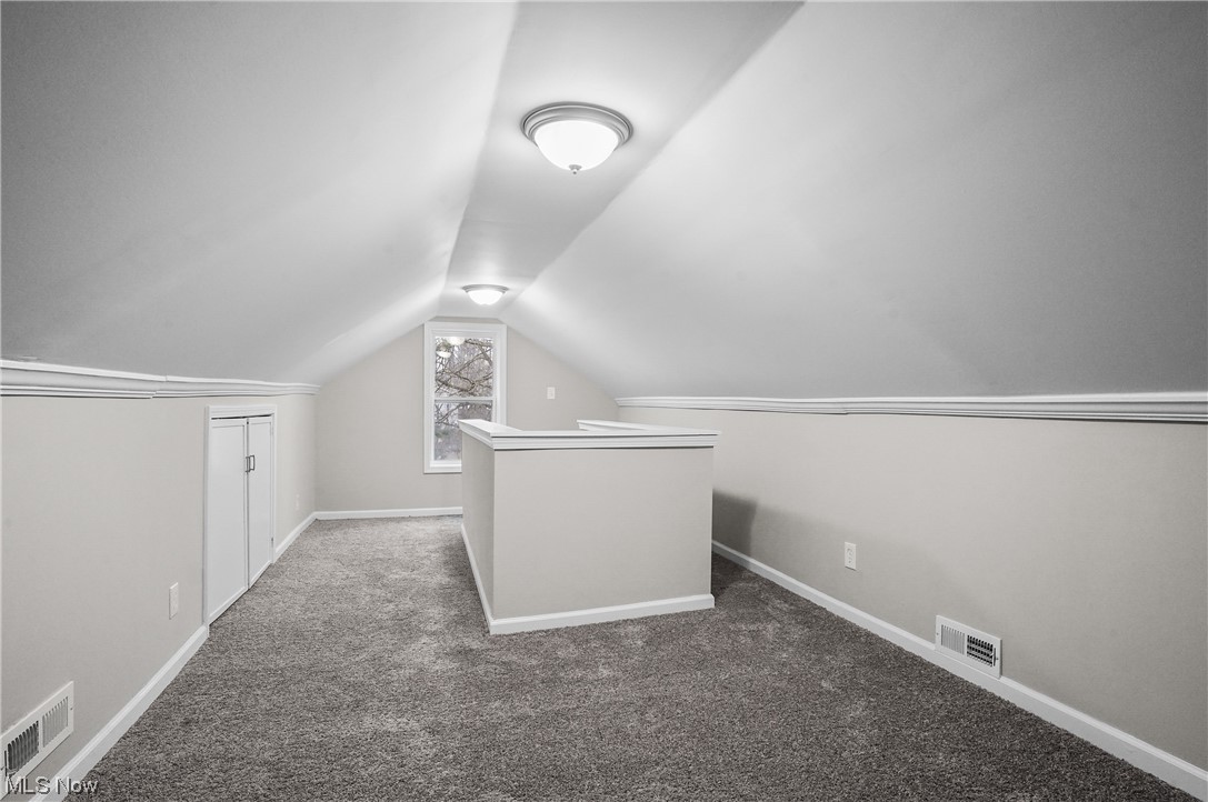 4159 Darrow Road Stow, OH 44224 - Photo 15 of 23 Bonus room featuring lofted ceiling and carpet