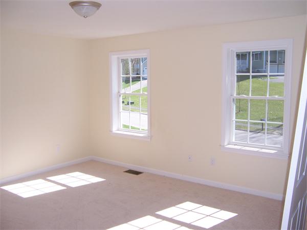 131 Robin Hill Road Groton, MA 01450 - Photo 17 of 22 an empty room with windows
