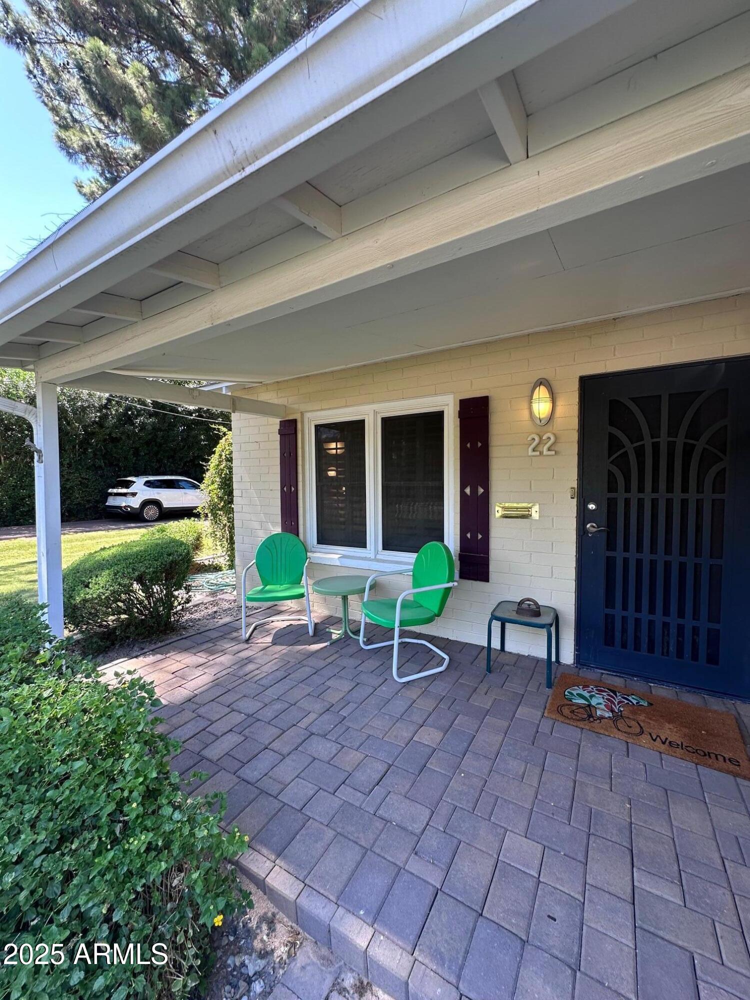 22 East 15th Street Tempe, AZ 85281 - Photo 16 of 84 a view of a patio with table and chairs near a large window