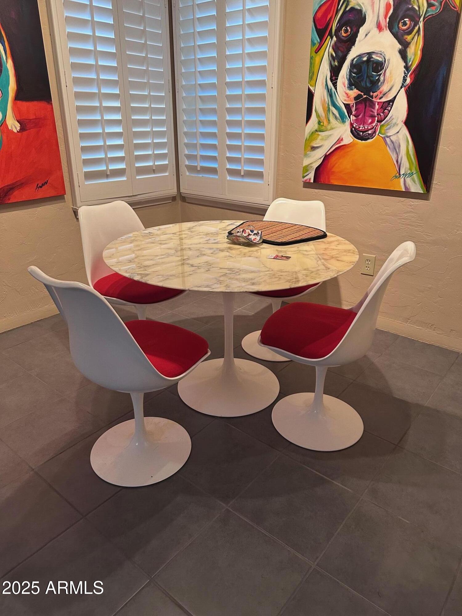 22 East 15th Street Tempe, AZ 85281 - Photo 21 of 84 a table with chairs and lamp