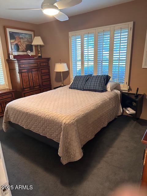 22 East 15th Street Tempe, AZ 85281 - Photo 46 of 84 a bedroom with a bed and dresser with wooden floor