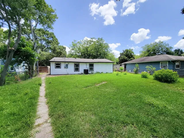 a house view with a garden space