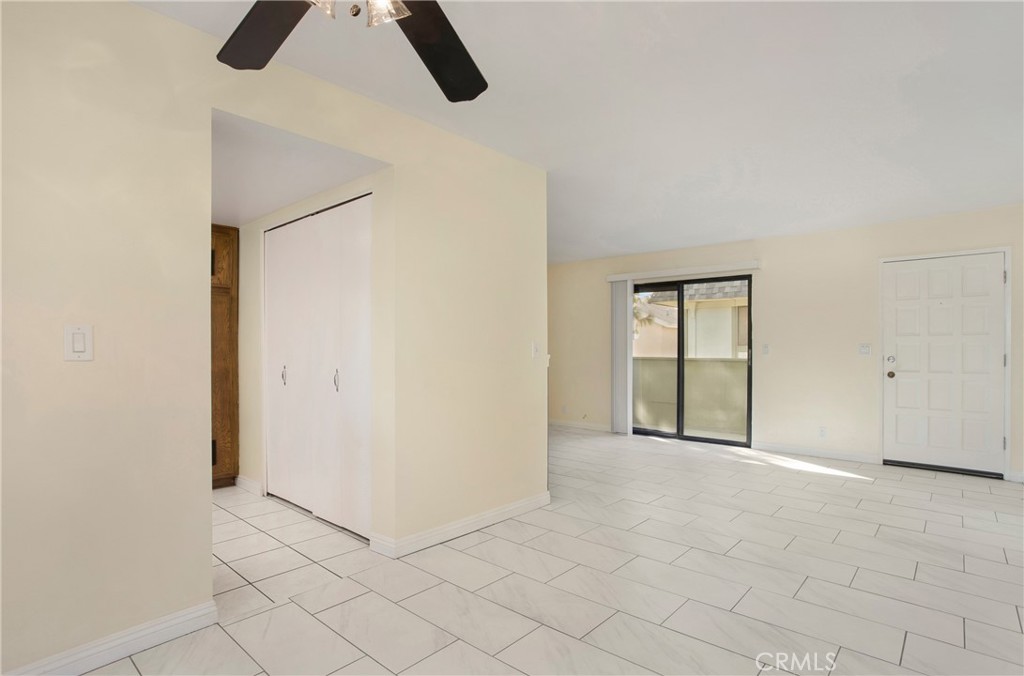 229 West Wilson Street, Unit 8 Costa Mesa, CA 92627 - Photo 5 of 11 a view of an empty room with window