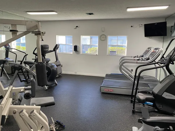 a view of a room with gym equipment