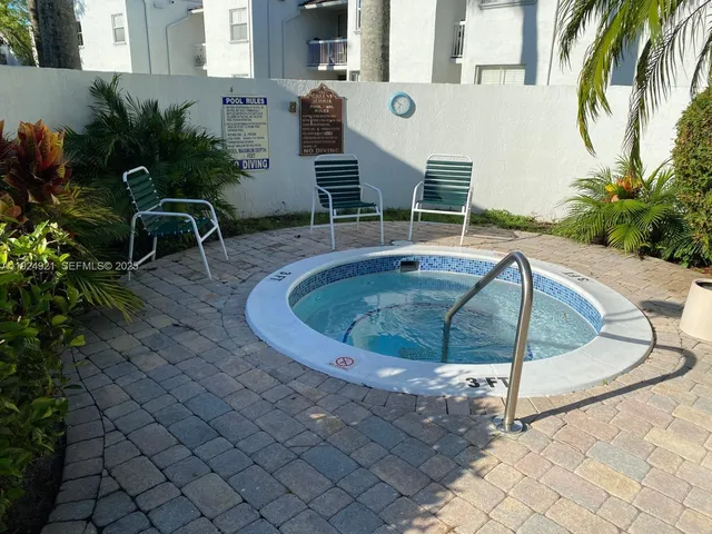 a view of outdoor space yard swimming pool and sitting area