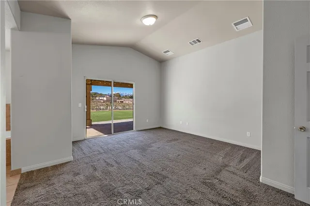 a bathroom with a granite countertop sink a mirror and a bathtub