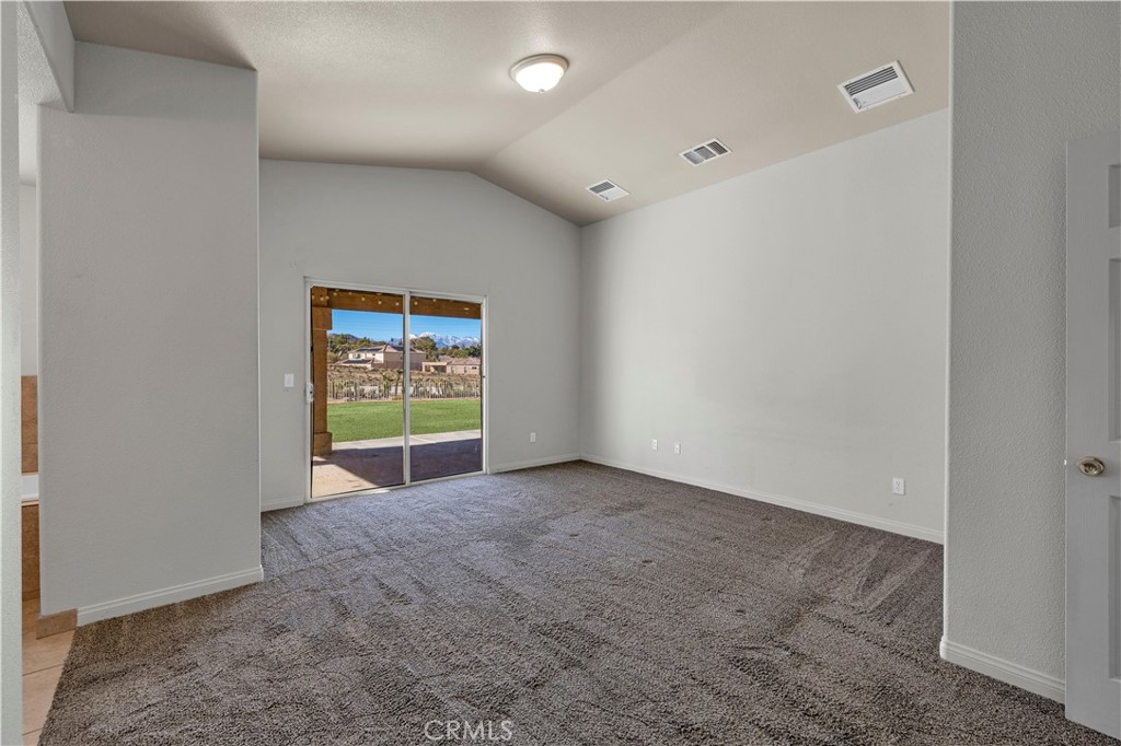 57031 Selecta Avenue Yucca Valley, CA 92284 - Photo 18 of 56 a view of an empty room with a window