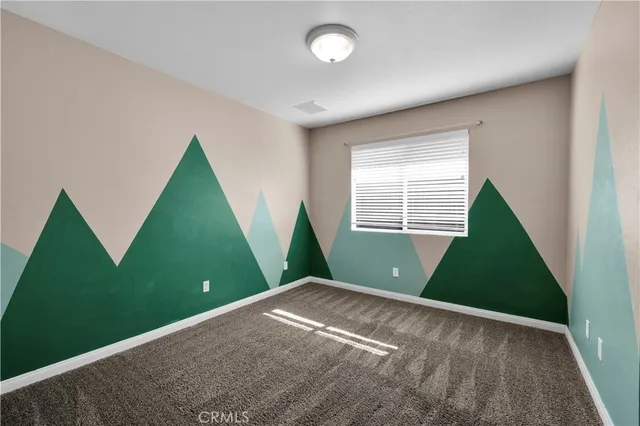 a view of an empty room with window