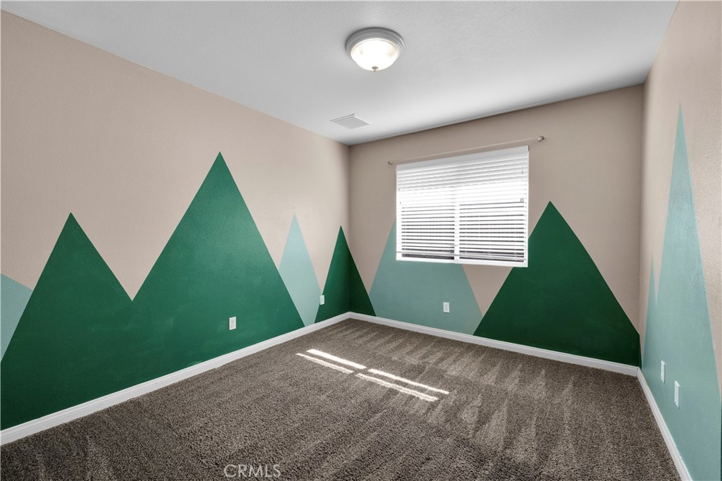 57031 Selecta Avenue Yucca Valley, CA 92284 - Photo 22 of 56 a view of a room with air conditioner and window