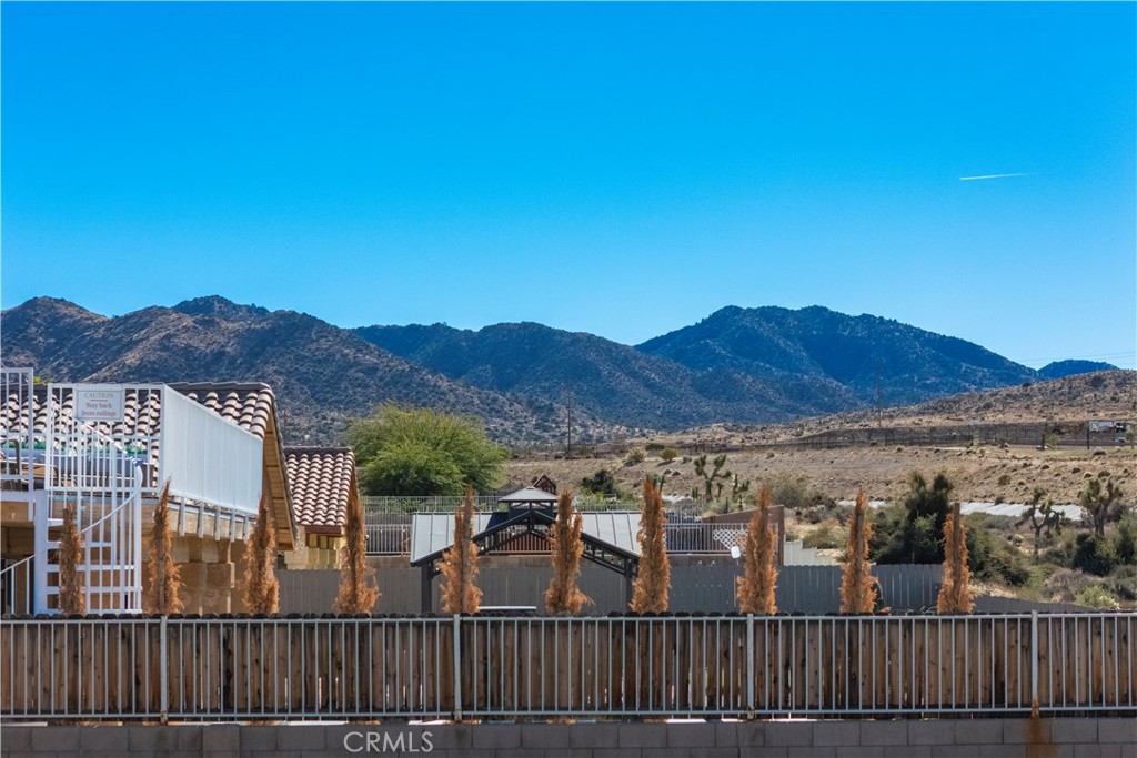 57031 Selecta Avenue Yucca Valley, CA 92284 - Photo 45 of 56 a view of a street from a balcony