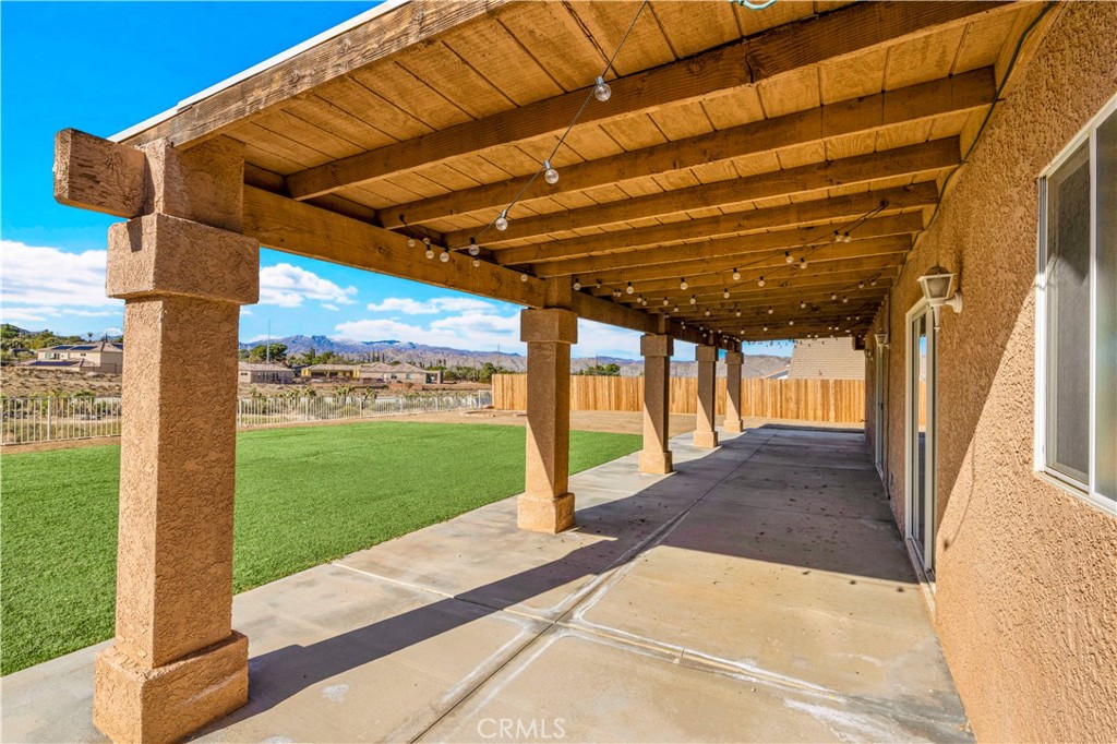 57031 Selecta Avenue Yucca Valley, CA 92284 - Photo 7 of 56 a view of a backyard with a garden