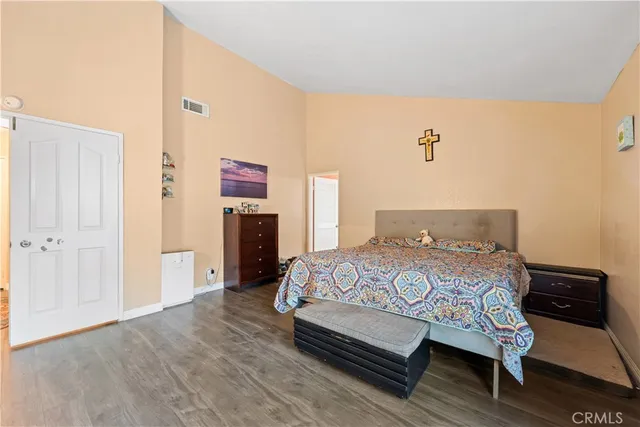 a large white kitchen with a large window