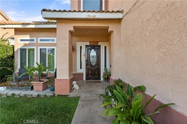 a front view of a house with a porch