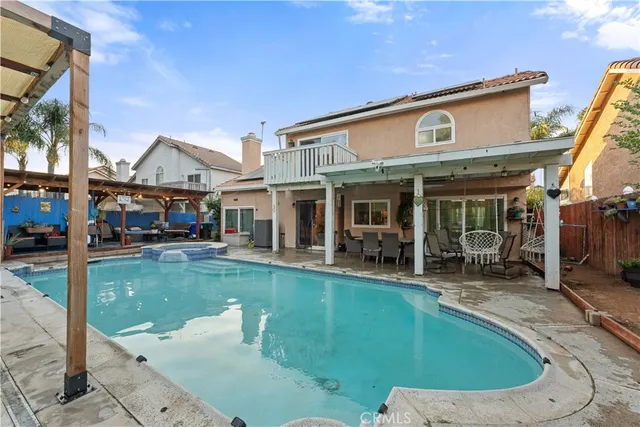 a view of a house with a swimming pool