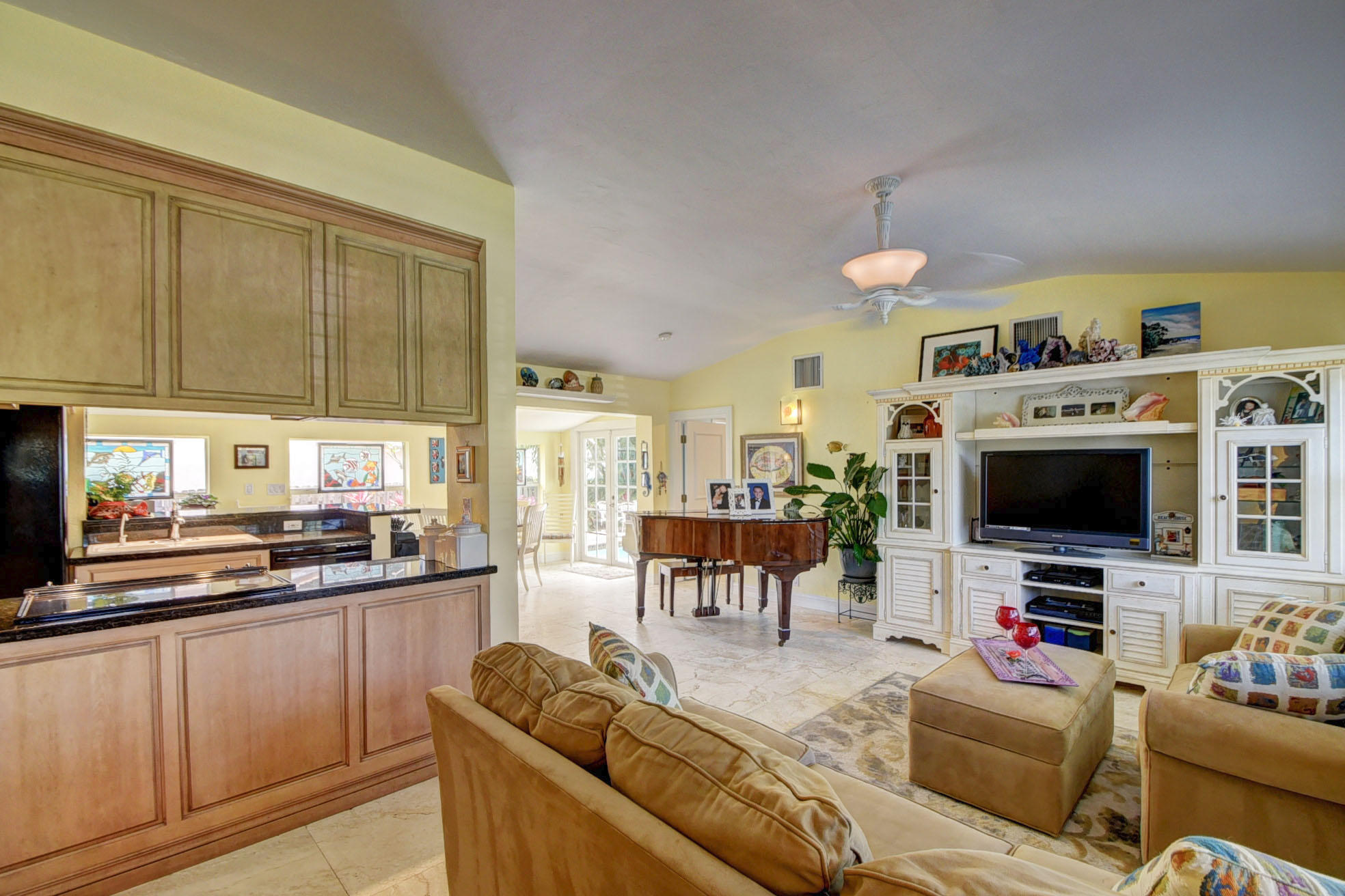 470 Northeast 14th Street Boca Raton, FL 33432 - Photo 3 of 51 a living room with furniture and a flat screen tv