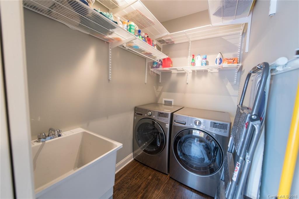 2837 Sharon Road Charlotte, NC 28211 - Photo 22 of 24 a view of storage and utility room with washer and dryer