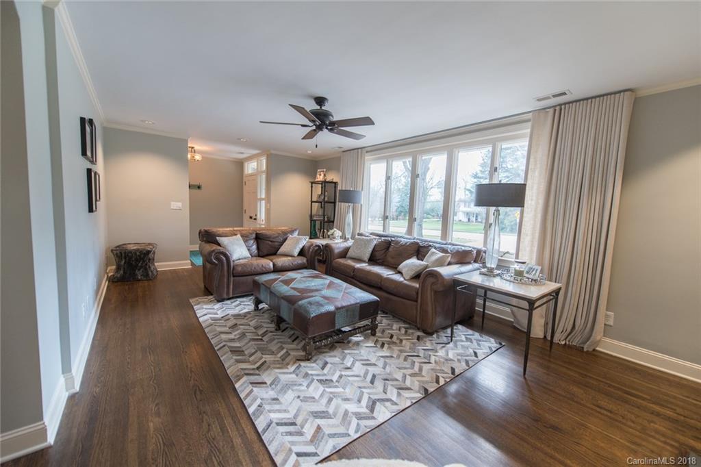 2837 Sharon Road Charlotte, NC 28211 - Photo 7 of 24 a living room with furniture and a large window